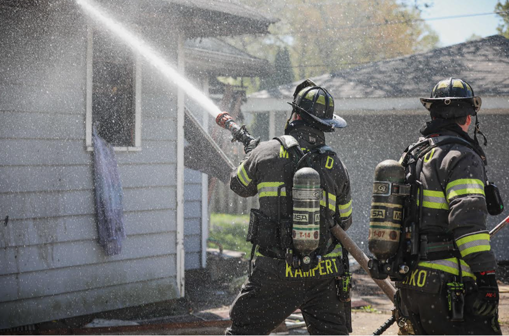 Cary Explosion firemen hoisng