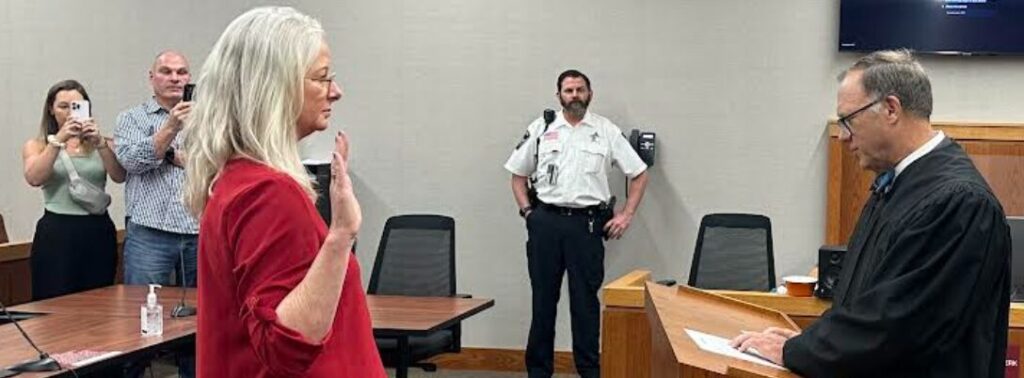 Millie being sworn in