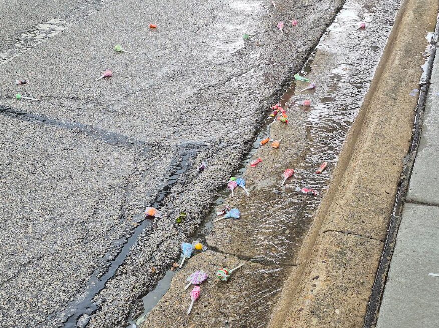4th 25 rain in gutters with candy left uncollected