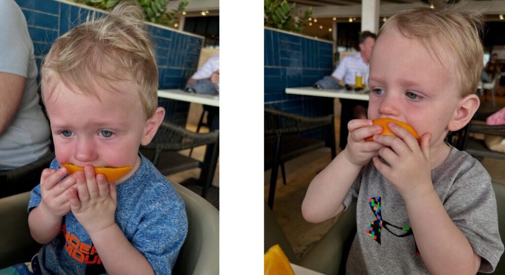 Kids eating fruit