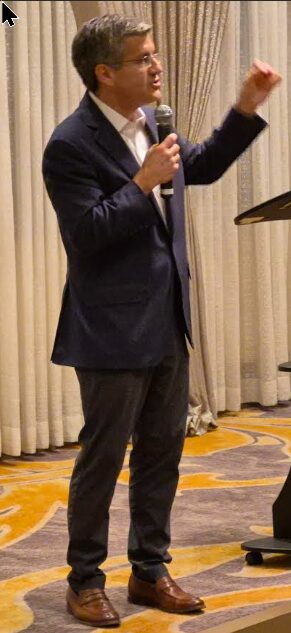 Ted standing arm up