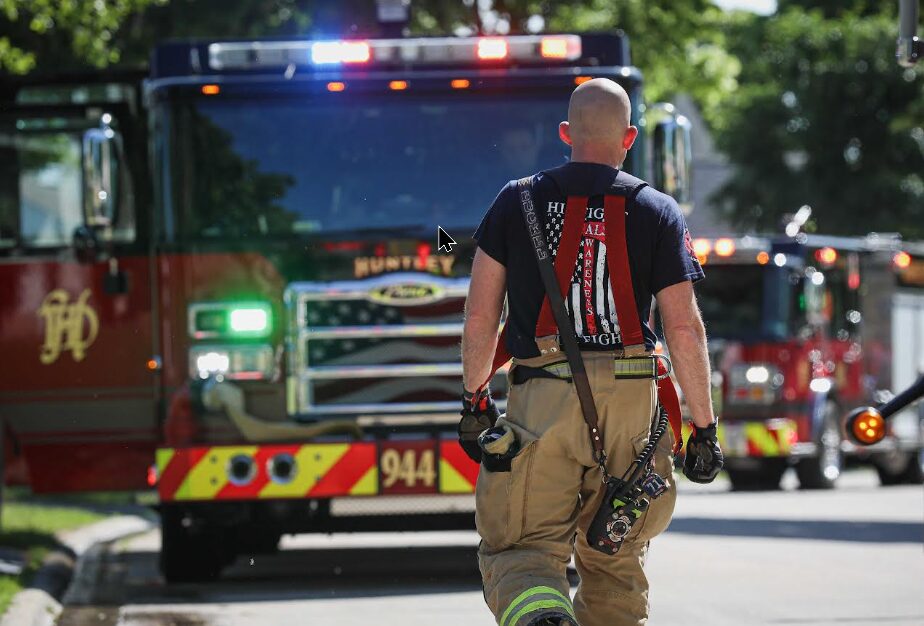 Huntley firefighter walking toward engine
