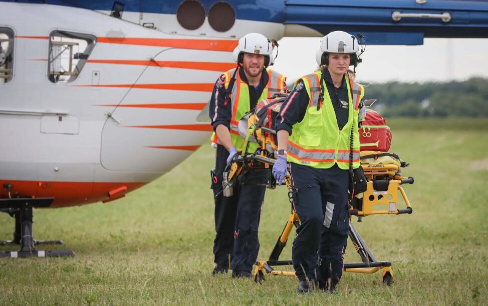 Route 173 and Beck Road, Harvard man on stretcher