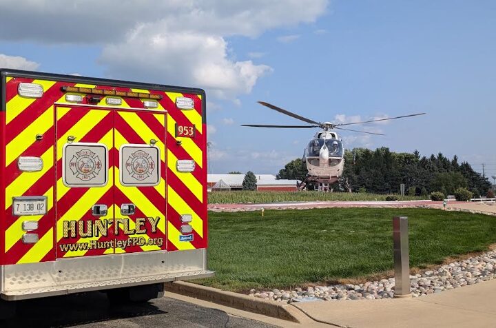 Huntley Hospital helo pad with copter flying