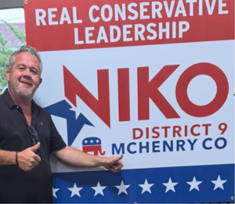 Niko with sign